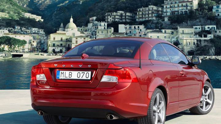 Back Pose Of 2010 Volvo C70 Near Sea
